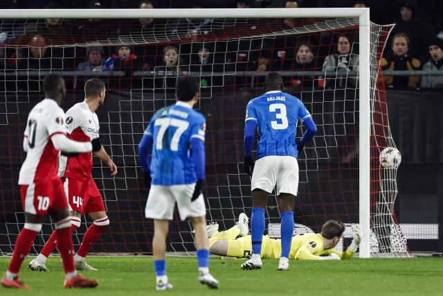 Genk's Moroccan defender #77 Zakaria El Ouahdi (C) reacts after scoring his team first goal during UEFA Europa League 1st round day 7 football match between FC Utrecht and KRC Genk at the Galgenwaard Stadium in Utrecht, Netherlands, on January 22, 2026. (Photo by Robin van Lonkhuijsen / ANP / AFP) / Netherlands OUT