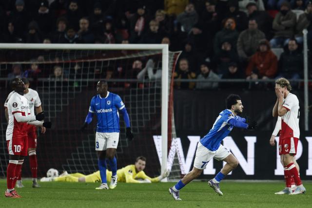 Genk's Moroccan defender #77 Zakaria El Ouahdi (2nd L) celebrates after scoring his team first goal during UEFA Europa League 1st round day 7 football match between FC Utrecht and KRC Genk at the Galgenwaard Stadium in Utrecht, Netherlands, on January 22, 2026. (Photo by Robin van Lonkhuijsen / ANP / AFP) / Netherlands OUT