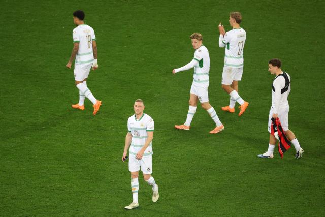 Eagles' players leave the pitch after losing the Europa League football match between OGC Nice and Go Ahead Eagles at Allianz Riviera stadium in Nice on January 22, 2026. (Photo by Valery HACHE / AFP)