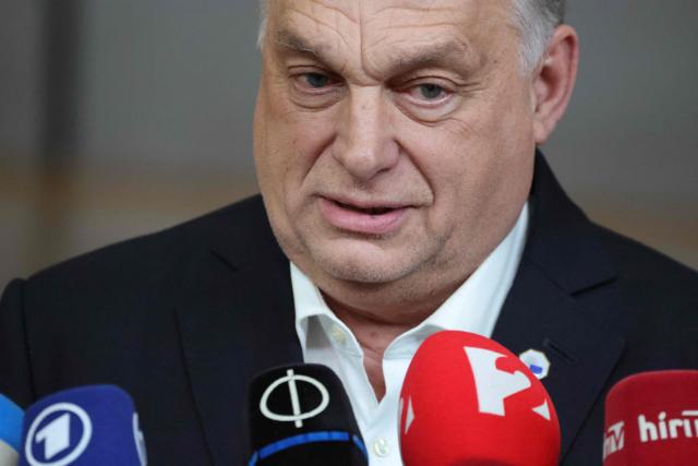 Hungary's Prime Minister Viktor Orban speaks to the press after an emergency meeting of the European Council over US President's Greenland threats, at the European headquarters in Brussels, on January 22, 2026. EU leaders meet on January 22, 2026, for an emergency summit on threats by US President to impose tariffs on countries opposed to his push to take Greenland, with crisis talks in Brussels coming to weigh potential countermeasures against the United States. (Photo by Ludovic MARIN / AFP)