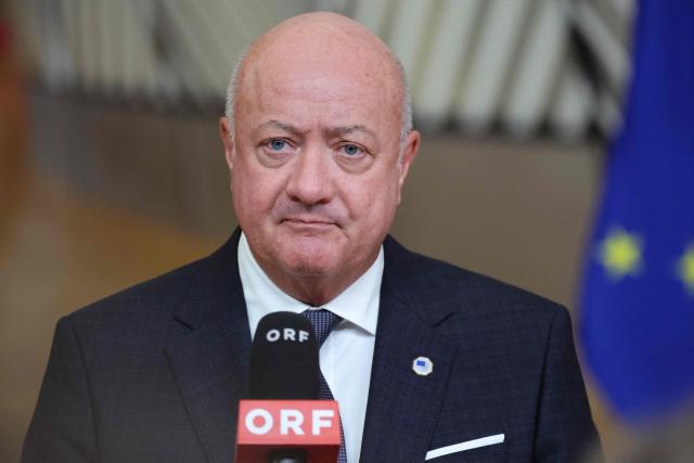 Austria's Chancellor Christian Stocker speaks to the press after an emergency meeting of the European Council over US President's Greenland threats, at the European headquarters in Brussels, on January 22, 2026. EU leaders meet on January 22, 2026, for an emergency summit on threats by US President to impose tariffs on countries opposed to his push to take Greenland, with crisis talks in Brussels coming to weigh potential countermeasures against the United States. (Photo by Ludovic MARIN / AFP)