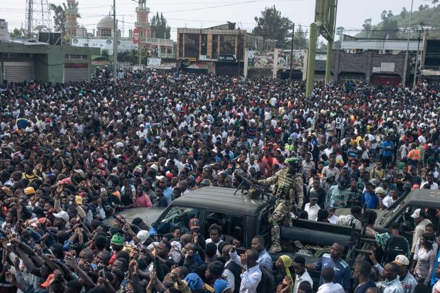 (FILES) An M23 soldier stands on a pick up truck as residents gather at the gates of the Stade de l'Unite'(Unity Stadium) in Goma on February 6, 2025 ahead of a schduled meeting called by the armed group. A year after the M23 armed group seized Goma, residents of the major city in eastern DRC are living in a "catastrophic" situation, according to the Congolese government spokesperson.
On January 26, 2025, a million residents were sheltering in their homes when the Congolese army and its allies abandoned the capital of North Kivu province. Hundreds of Rwandan soldiers, allied with the anti-government armed group M23, had just crossed the border and entered the lakeside city, at the cost of intense fighting that left thousands dead.
Felix Tshisekedi, his successor as the DRC's president, accuses Kabila of being the brains behind the armed group. (Photo by Alexis Huguet / AFP)