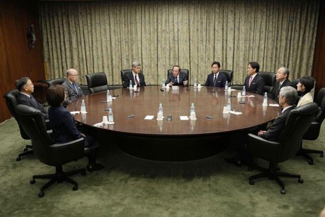 Bank of Japan Governor Kazuo Ueda (C) and others attend the monetary policy meeting at the Bank of Japan headquarters in Tokyo on January 23, 2026. (Photo by JIJI Press / AFP) / Japan OUT