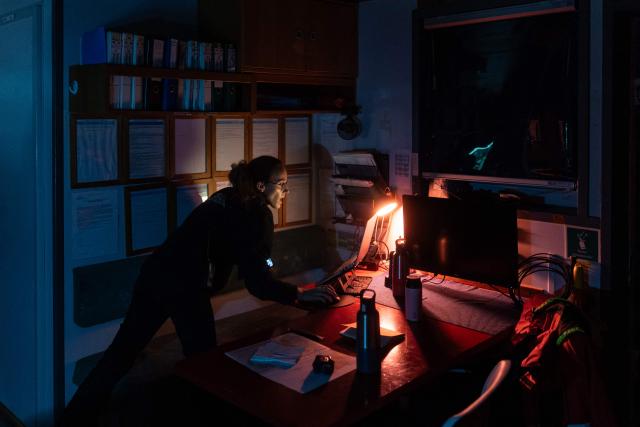 (FILES) Search and Rescue coordinator, Mar, prepares for a rescue operation onboard of the migrants rescue ship "Ocean Viking" operated by the NGO SOS Mediterranee, at the search-and-rescue zone of the international waters between Malta and Tunisia, on December 31, 2025. (Photo by Sameer Al-DOUMY / AFP)