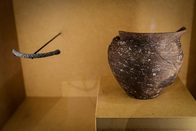 This photograph shows items as part of the exhibition named Lavau 'A Celtic Prince on the edge of the Seine river' displayed at the Modern Art Museum of Troyes, on January 22, 2026. As it is one of the most important archaeological discoveries in France in 50 years, the exceptional treasure unearthed in the tomb of a Celtic prince in Lavau, in the northeast of the country, will be unveiled to the public for the first time on January 24. (Photo by STEPHANE DE SAKUTIN / AFP)