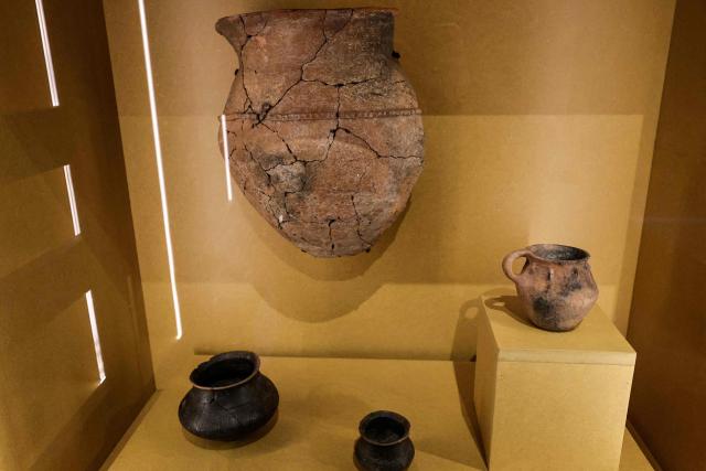 This photograph shows items as part of the exhibition named Lavau 'A Celtic Prince on the edge of the Seine river' displayed at the Modern Art Museum of Troyes, on January 22, 2026. As it is one of the most important archaeological discoveries in France in 50 years, the exceptional treasure unearthed in the tomb of a Celtic prince in Lavau, in the northeast of the country, will be unveiled to the public for the first time on January 24. (Photo by STEPHANE DE SAKUTIN / AFP)