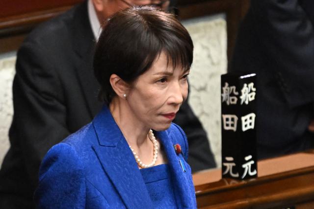 Japan's Prime Minister Sanae Takaichi attends the House of Representatives plenary session at the Diet in Tokyo on January 23, 2026. Takaichi dissolved parliament ahead of a snap election on February 8, counting on her cabinet's high poll numbers to steer her otherwise unpopular ruling party to victory. (Photo by Kazuhiro NOGI / AFP)