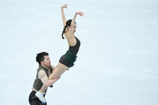 China’s Xiao Zixi and He Linghao perform in the ice dance free skating during the ISU figure skating Four Continents Championships 2026 in Beijing on January 23, 2026. (Photo by WANG Zhao / AFP)