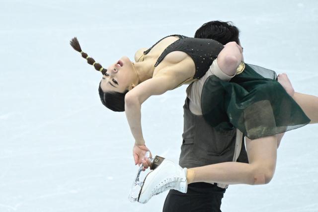 China’s Xiao Zixi and He Linghao perform in the ice dance free skating during the ISU figure skating Four Continents Championships 2026 in Beijing on January 23, 2026. (Photo by WANG Zhao / AFP)