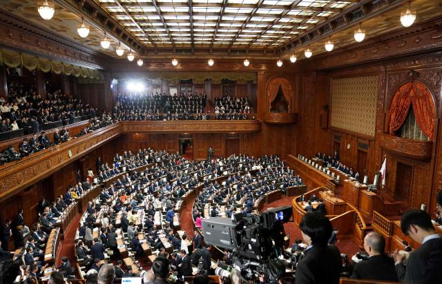 This photo shows the scene in the House of Representatives plenary session before the dissolution of the House of Representatives at the Diet in Tokyo on January 23, 2026. Japanese Prime Minister Sanae Takaichi dissolved parliament on January 23 ahead of a snap election on February 8, counting on her cabinet's high poll numbers to steer her otherwise unpopular ruling party to victory. (Photo by Kazuhiro NOGI / AFP)