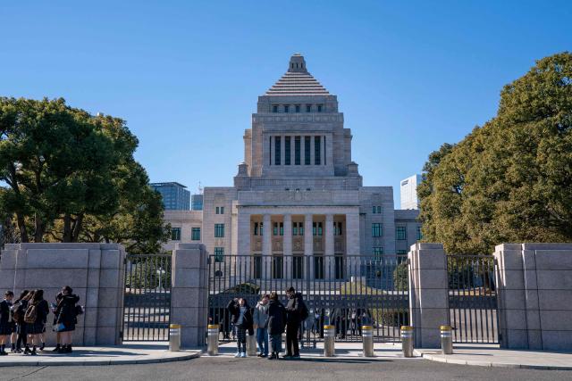 The Japan's National Diet Building is seen in Tokyo on January 23, 2026. Japanese Prime Minister Sanae Takaichi dissolved parliament on January 23 ahead of a snap election on February 8, counting on her cabinet's high poll numbers to steer her otherwise unpopular ruling party to victory. (Photo by Kazuhiro NOGI / AFP)