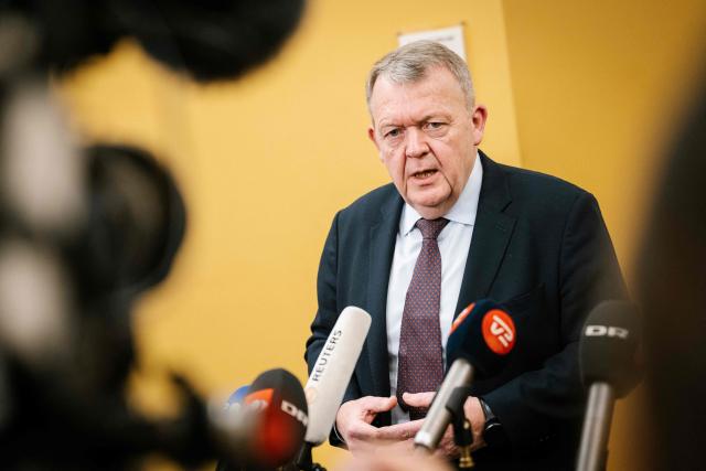Danish Foreign Minister Lars Loekke Rasmussen addresses journalists at a doorstep after a meeting of the Foreign Policy Committee at Christiansborg in Copenhagen, Denmark, on January 23, 2026. On the agenda is Denmark's relationship with the US. (Photo by Emil Nicolai Helms / Ritzau Scanpix / AFP) / Denmark OUT