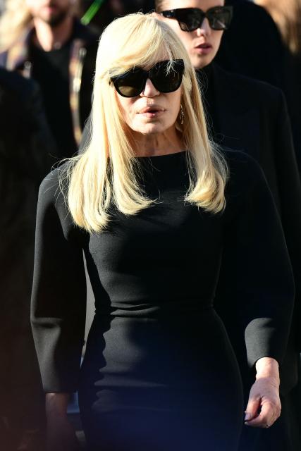 Italian fashion designer Donatella Versace arrives at the funeral ceremony for the late Italian fashion designer Valentino Gavarani at the Basilic of Santa Maria degli Angeli e dei Martiri, in Rome on January 23, 2026. (Photo by Stefano RELLANDINI / AFP)