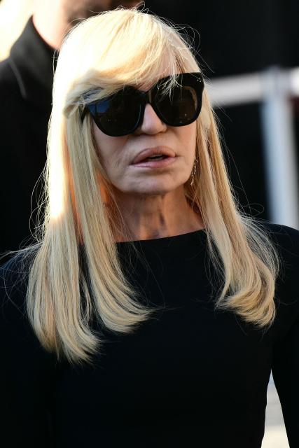 Italian fashion designer Donatella Versace arrives at the funeral ceremony for the late Italian fashion designer Valentino Gavarani at the Basilic of Santa Maria degli Angeli e dei Martiri, in Rome on January 23, 2026. (Photo by Stefano RELLANDINI / AFP)