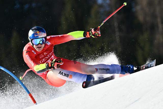 Switzerland's Marco Odermatt competes in the Men's Super G event of the FIS Alpine Ski World Cup in Kitzbuehel, Austria, on January 23, 2026. (Photo by Joe Klamar / AFP)