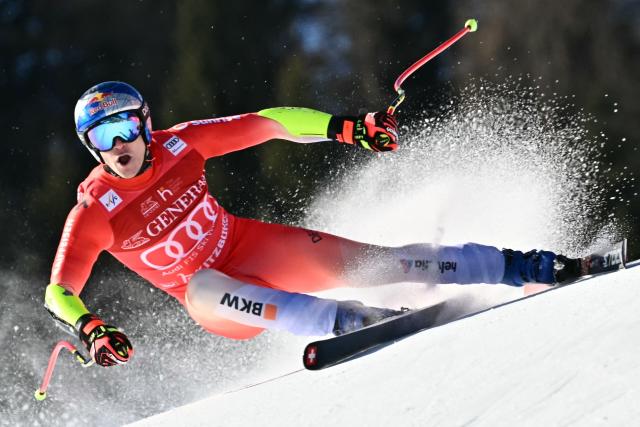 Switzerland's Marco Odermatt competes in the Men's Super G event of the FIS Alpine Ski World Cup in Kitzbuehel, Austria, on January 23, 2026. (Photo by Joe Klamar / AFP)