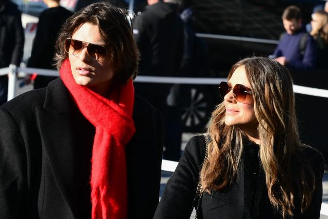 British actress and model Liz Hurley (R) and her son Damian Hurley arrive at the funeral ceremony for the late Italian fashion designer Valentino Gavarani at the Basilic of Santa Maria degli Angeli e dei Martiri, in Rome on January 23, 2026. (Photo by Stefano RELLANDINI / AFP)