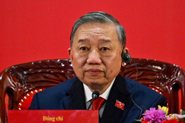 Vietnam's relected Communist Party General Secretary To Lam addresses a press conference after the closing ceremony of the Communist Party of Vietnam's (CPV) 14th National Congress at the National Convention Centre in Hanoi on January 23, 2026. Vietnam's Communist Party "unanimously" re-elected To Lam to the post of general secretary on January 23, it said on its website, confirming he will remain the country's top leader for the next five years. (Photo by Nhac NGUYEN / AFP)