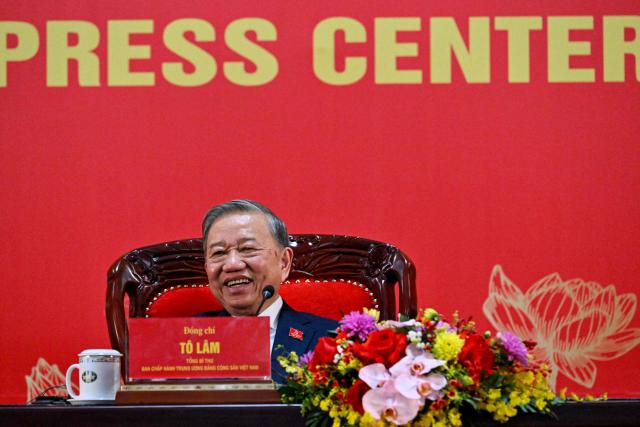 Vietnam's relected Communist Party General Secretary To Lam addresses a press conference after the closing ceremony of the Communist Party of Vietnam's (CPV) 14th National Congress at the National Convention Centre in Hanoi on January 23, 2026. Vietnam's Communist Party "unanimously" re-elected To Lam to the post of general secretary on January 23, it said on its website, confirming he will remain the country's top leader for the next five years. (Photo by Nhac NGUYEN / AFP)
