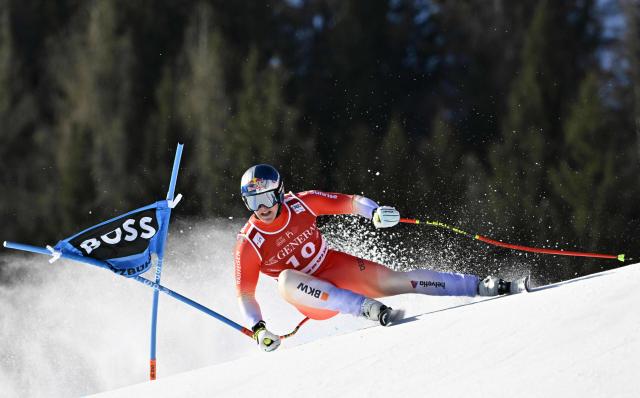 Switzerland's Franjo Von Allmen competes in the Men's Super-G event of the FIS Alpine Skiing World Cup in Kitzbuehel, Austria, on January 23, 2026. (Photo by HANS KLAUS TECHT / APA / AFP) / Austria OUT