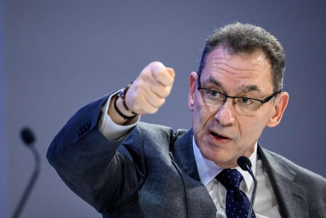 Pfizer chairman and CEO Albert Bourla gestures as he speaks during the final day of the World Economic Forum (WEF) annual meeting in Davos on January 23, 2026. (Photo by Fabrice COFFRINI / AFP)