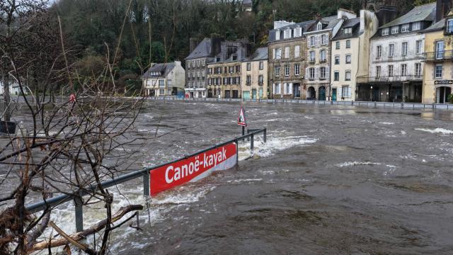 This aerial photograph shows streets in the city center street flooded by the Laita river in Quimperle, western France on January 23, 2026. (Photo by Damien MEYER / AFP)