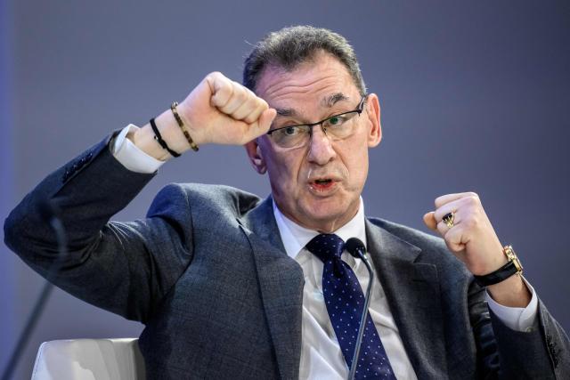 Pfizer chairman and CEO Albert Bourla gestures as he speaks during the final day of the World Economic Forum (WEF) annual meeting in Davos on January 23, 2026. (Photo by Fabrice COFFRINI / AFP)