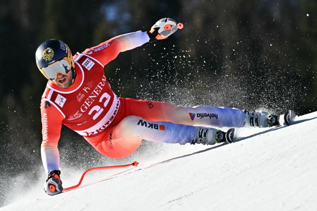 Switzerland's Justin Murisier competes in the Men's Super G event of the FIS Alpine Ski World Cup in Kitzbuehel, Austria, on January 23, 2026. (Photo by Joe Klamar / AFP)