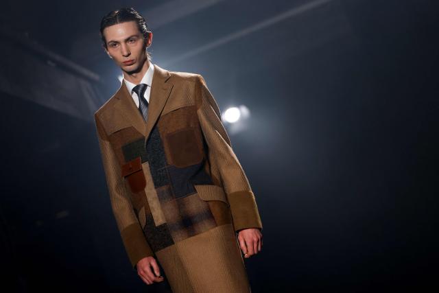 A model presents a creation by Junya Watanabe for the Menswear Ready-to-wear Fall-Winter 2026/2027 collection as part of the Men Paris Fashion Week in Paris on January 23, 2026.  (Photo by Ian LANGSDON / AFP)