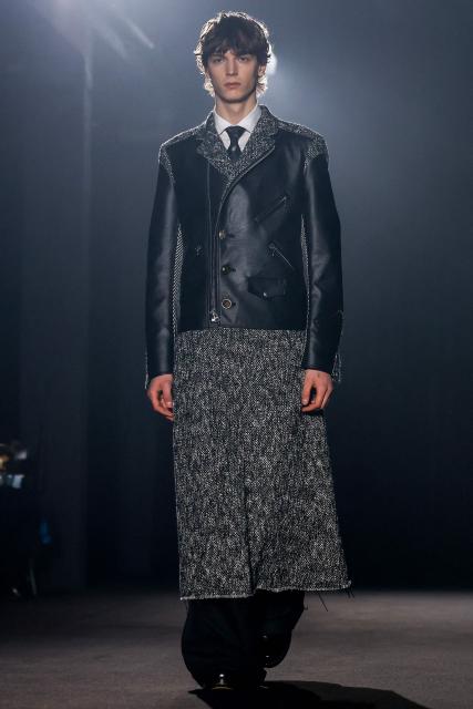 A model presents a creation by Junya Watanabe for the Menswear Ready-to-wear Fall-Winter 2026/2027 collection as part of the Men Paris Fashion Week in Paris on January 23, 2026.  (Photo by Ian LANGSDON / AFP)