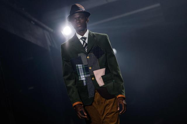 A model presents a creation by Junya Watanabe for the Menswear Ready-to-wear Fall-Winter 2026/2027 collection as part of the Men Paris Fashion Week in Paris on January 23, 2026.  (Photo by Ian LANGSDON / AFP)