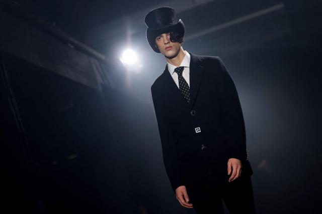 A model presents a creation by Junya Watanabe for the Menswear Ready-to-wear Fall-Winter 2026/2027 collection as part of the Men Paris Fashion Week in Paris on January 23, 2026.  (Photo by Ian LANGSDON / AFP)