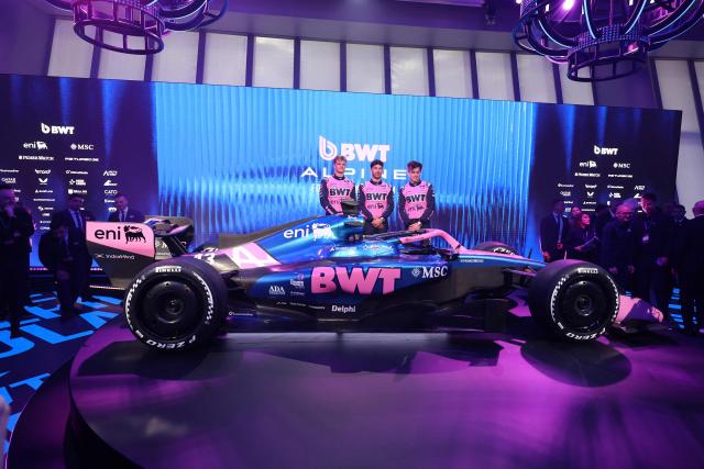 (From L) Alpine's Estonian test and reserve driver Paul Aron, Alpine's French driver Pierre Gasly and Alpine's Argentinian driver Franco Colapinto pose on stage next to the Alpine F1 new car during the presentation of Alpine season on January 23, 2026 in Barcelona. (Photo by Josep LAGO / AFP)