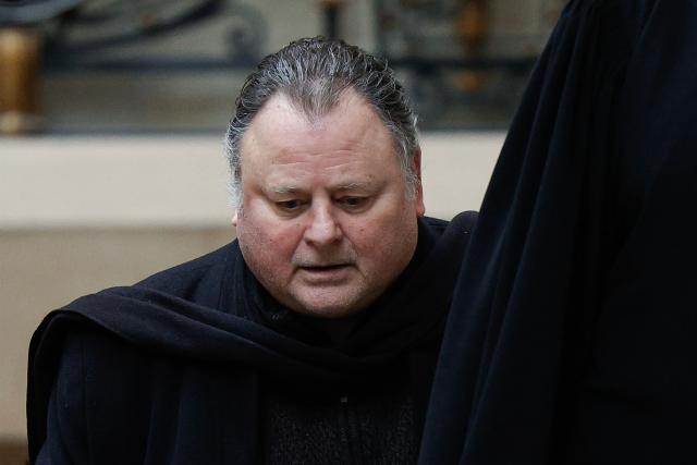 French film director Christophe Ruggia arrives to appear in his appeal trial for allegedly sexually assaulting French actress Adele Haenel when she was under 15 and he was in his mid to late 30s, six years after her allegations launched France's #MeToo movement, at the Paris Courthouse in Paris on January 23, 2026. The appeal trial of filmmaker Christophe Ruggia, who is on trial on charges of sexual assault on actress Adele Haenel between the ages of 12 and 14, resumes on January 23, 2026, after the Paris Court of Appeal had postponed it in December 2025. (Photo by GEOFFROY VAN DER HASSELT / AFP)