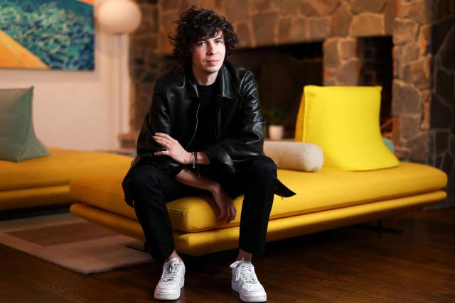 (FILES) French director Ugo Bienvenu poses during a photo session at the Residence de France in Beverly Hills, California, on December 3, 2025. Two independent productions take on giants Netflix and Disney: with Oscar nominations for ‘Arco’ and ‘Amйlie et la mйtaphysique des tubes’, French animation has scored twice and proven its vitality, despite the threat of AI. (Photo by VALERIE MACON / AFP)