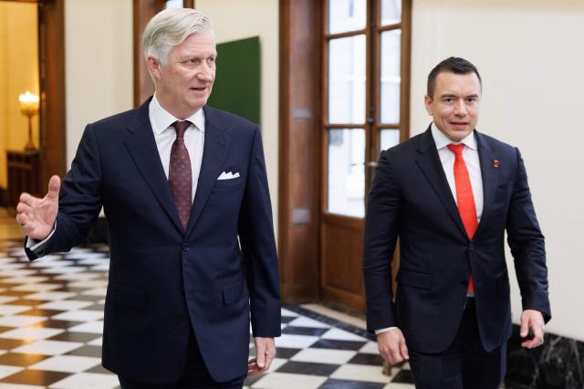 King Philippe of Belgium (L) and Ecuador's President Daniel Noboa walk prior to an audience at the Royal Palace in Brussels, on January 23, 2026. (Photo by BENOIT DOPPAGNE / Belga / AFP) / Belgium OUT