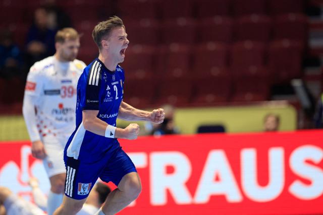 Iceland's right winger #02 Odinn Rikhardsson celebrates during the men's EHF Euro 2026 main round handball match Iceland v Croatia in Malmoe, Sweden, on January 23, 2026. (Photo by Andreas Hillergren/TT / TT NEWS AGENCY / AFP) / Sweden OUT