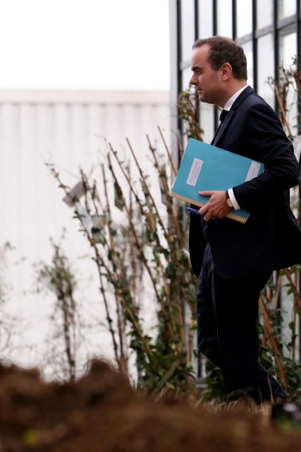 France's Prime Minister Sebastien Lecornu visits a housing project in Rosny-sous-Bois, in the suburb of Paris on January 23, 2026. (Photo by Thomas SAMSON / AFP)