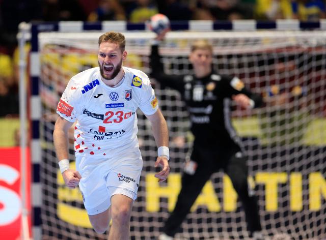 Croatia's pivot #23 Zlatko Rauzan celebrates during the men's EHF Euro 2026 main round handball match Iceland v Croatia in Malmoe, Sweden, on January 23, 2026. (Photo by Andreas Hillergren/TT / various sources / AFP) / Sweden OUT