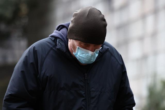 Richard Wilkins leaves Winchester Crown Court in Winchester, southern England, on January 23, 2026, where he appeared having been charged with sexual offences against Joanne Young. (Photo by Henry NICHOLLS / AFP)