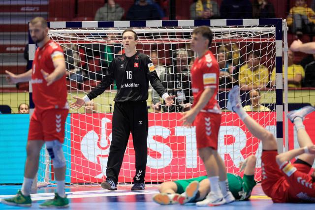 Switzerland's goalkeeper #16 Nikola Portner reacts during the men's EHF Euro 2026 main round handball match Switzerland v Hungary in Malmoe, Sweden, on January 23, 2026. (Photo by Andreas Hillergren/TT / TT NEWS AGENCY / AFP) / Sweden OUT