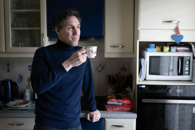 French researcher Laurent Vinatier, who was arrested in Russia in June 2024 and released in January 2026, poses in his family house in Issy-les-Moulineaux on January 23, 2026. French researcher Laurent Vinatier arrived in France on January 8, 2026 following a prisoner exchange involving a Russian basketball player wanted in the United States. (Photo by JOEL SAGET / AFP)