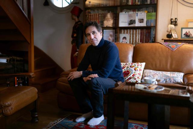 French researcher Laurent Vinatier, who was arrested in Russia in June 2024 and released in January 2026, poses in his family house in Issy-les-Moulineaux on January 23, 2026. French researcher Laurent Vinatier arrived in France on January 8, 2026 following a prisoner exchange involving a Russian basketball player wanted in the United States. (Photo by JOEL SAGET / AFP)