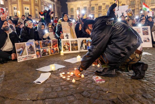 People take part in a demonstration in support of Kurds in northern Syria, in Amsterdam on January 23, 2026. More than 134,000 people have been displaced in northeast Syria, according to the United Nations, after clashes and a fragile ceasefire deal between government troops and the Kurdish-led Syrian Democratic Forces (SDF). (Photo by Laurens Niezen / ANP / AFP) / Netherlands OUT