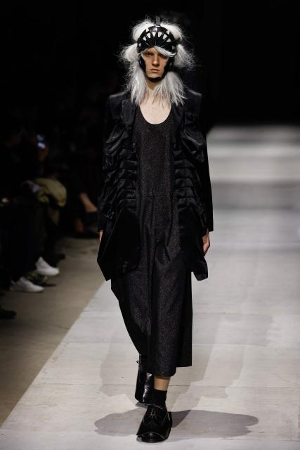 A model presents a creation by Comme des Garcons Homme Plus for the Menswear Ready-to-wear Fall-Winter 2026/2027 collection as part of the Men Paris Fashion Week in Paris on January 23, 2026.  (Photo by Ian LANGSDON / AFP)