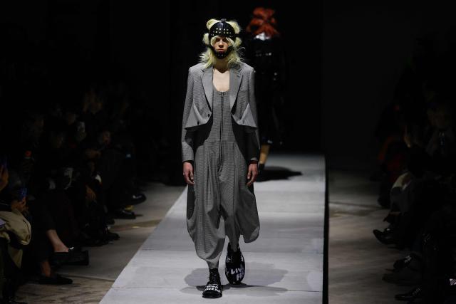 A model presents a creation by Comme des Garcons Homme Plus for the Menswear Ready-to-wear Fall-Winter 2026/2027 collection as part of the Men Paris Fashion Week in Paris on January 23, 2026.  (Photo by Ian LANGSDON / AFP)
