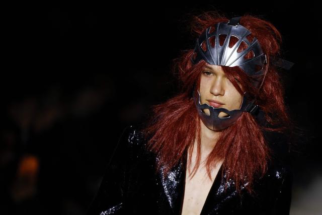 A model presents a creation by Comme des Garcons Homme Plus for the Menswear Ready-to-wear Fall-Winter 2026/2027 collection as part of the Men Paris Fashion Week in Paris on January 23, 2026.  (Photo by Ian LANGSDON / AFP)