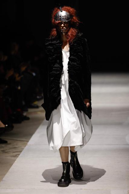 A model presents a creation by Comme des Garcons Homme Plus for the Menswear Ready-to-wear Fall-Winter 2026/2027 collection as part of the Men Paris Fashion Week in Paris on January 23, 2026.  (Photo by Ian LANGSDON / AFP)