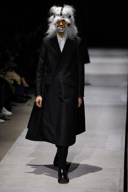 A model presents a creation by Comme des Garcons Homme Plus for the Menswear Ready-to-wear Fall-Winter 2026/2027 collection as part of the Men Paris Fashion Week in Paris on January 23, 2026.  (Photo by Ian LANGSDON / AFP)