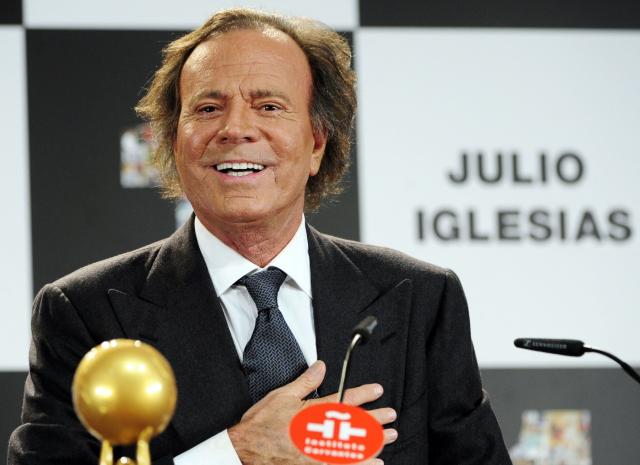 (FILES) Spanish singer Julio Iglesias speaks after receiving the Award for artist who has sold the most records in Spain and the Latino Artist Award for the most albums sold in the world at Cervantes Instittute in Madrid on December 16, 2011. Spanish prosecutors on January 23, 2026 shelved a sex abuse and human trafficking complaint against veteran singer Julio Iglesias, saying Spain's courts had no jurisdiction in the case. (Photo by Javier SORIANO / AFP)
